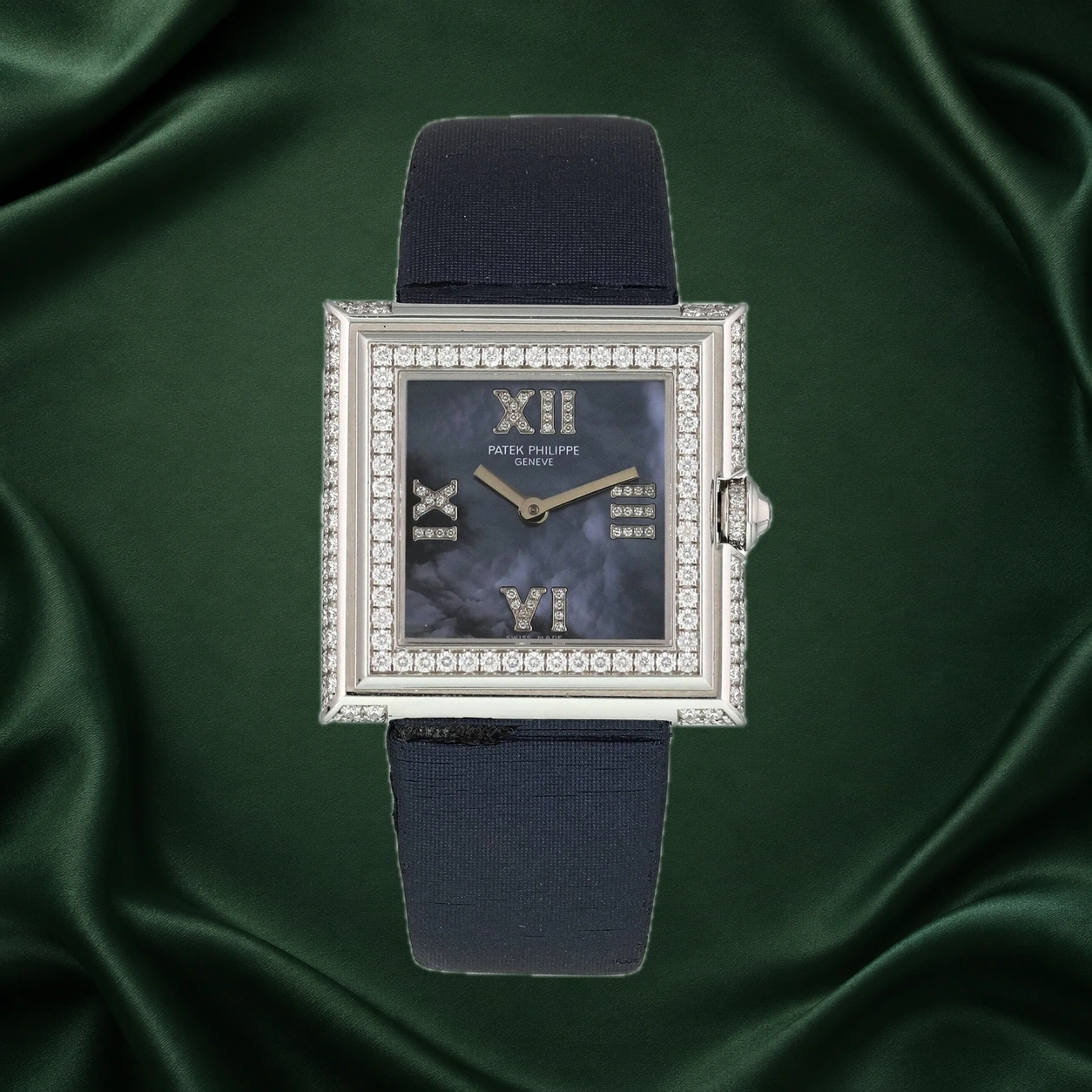 Patek Philippe Gondolo 4869G reference photograph with a square white gold diamond-set case, blue mother-of-pearl dial and blue strap