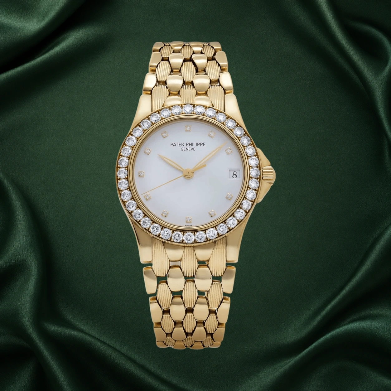 Patek Philippe Neptune 5081/10J-001 reference photograph with a white diamond-set dial, diamond bezel and yellow gold bracelet
