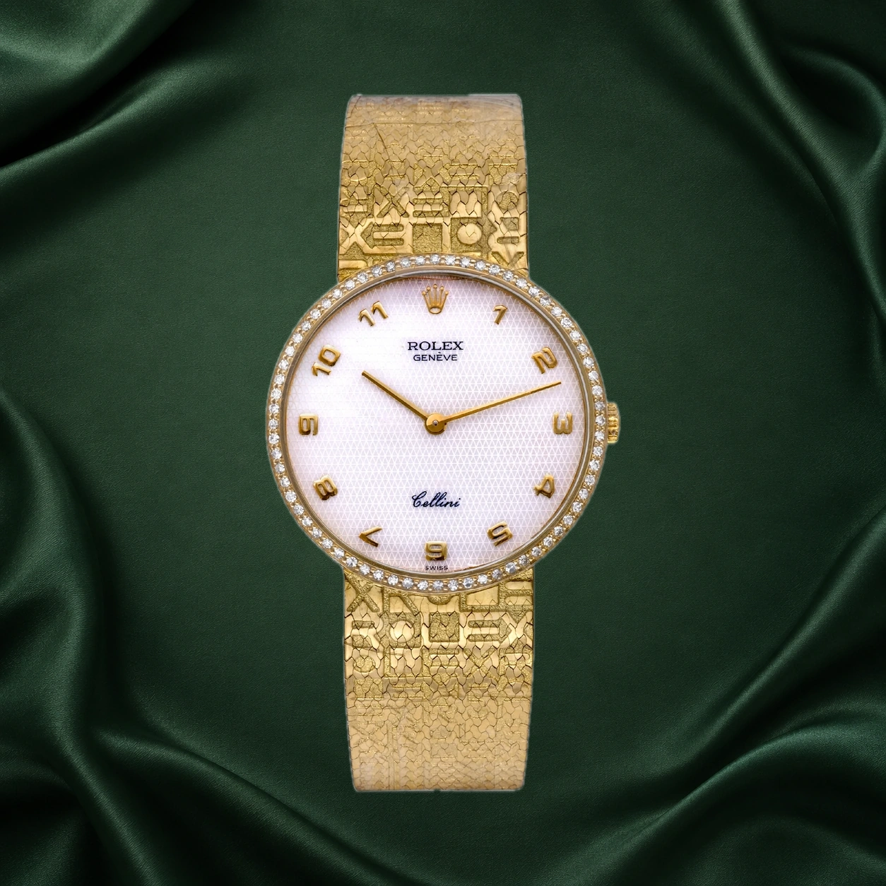 Rolex Cellini with a diamond bezel, patterned mother-of-pearl dial and engraved gold bracelet, catalogued by Antiquorum as reference 5134