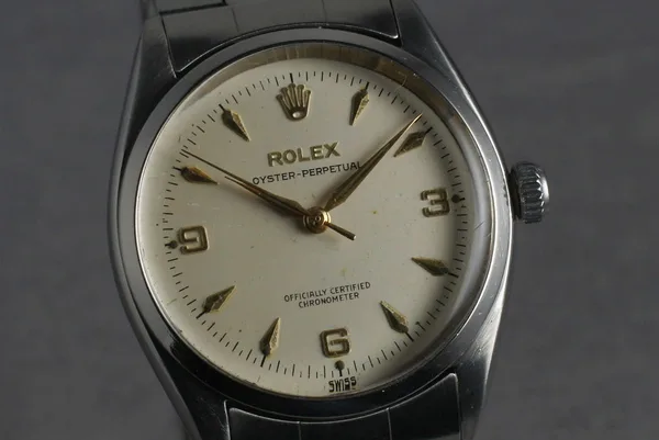 Rolex Oyster Perpetual Ref. 6564, three-quarter view, source example 1