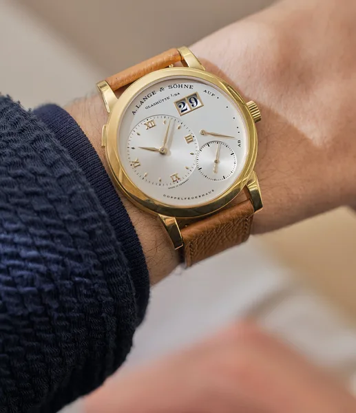 A. Lange & Söhne LANGE 1 Ref. 101.001, three-quarter view, source example 1