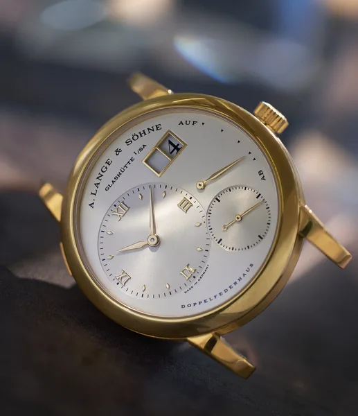 A. Lange & Söhne LANGE 1 Ref. 101.001, three-quarter view, source example 1