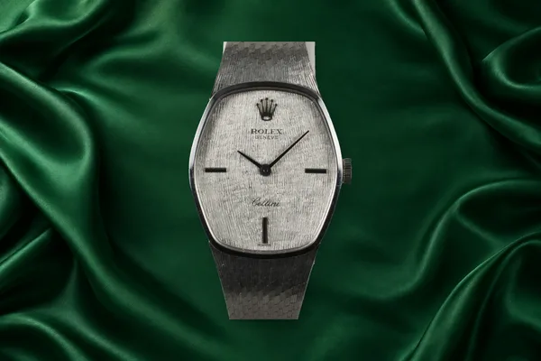 Rolex Cellini · white gold bracelet watch, front view, source example 1