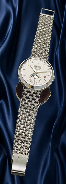 Patek Philippe Gold bracelet watch Ref. 3448, three-quarter view, source example 1