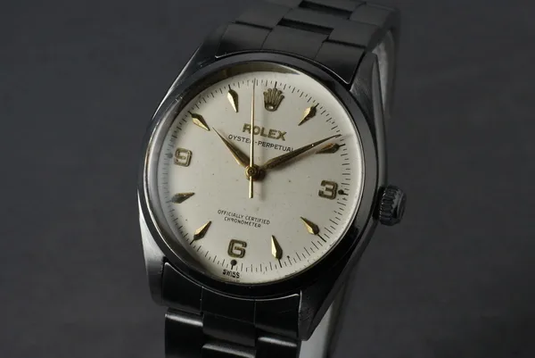 Rolex Oyster Perpetual Ref. 6564, three-quarter view, source example 1