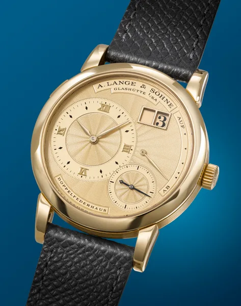 A. Lange & Söhne Lange 1A Ref. 112.021, three-quarter view, source example 1