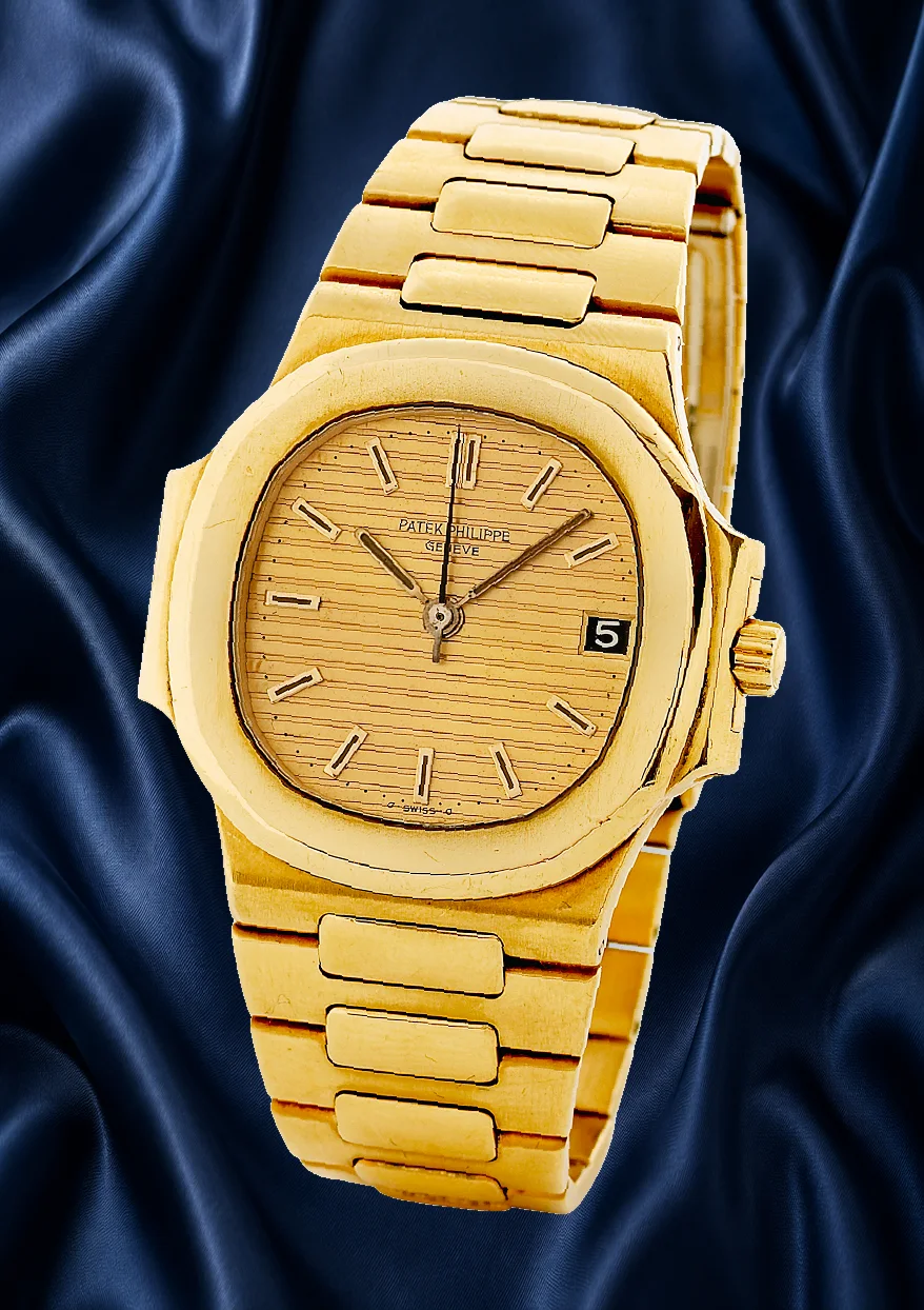 Patek Philippe Nautilus 3800/1 gold watch on blue silk, shown as a model reference